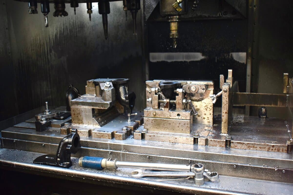 Interior of CNC machine in operation at KAELE SRL